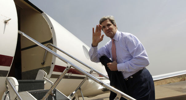 John Kerry boarding his private jet.