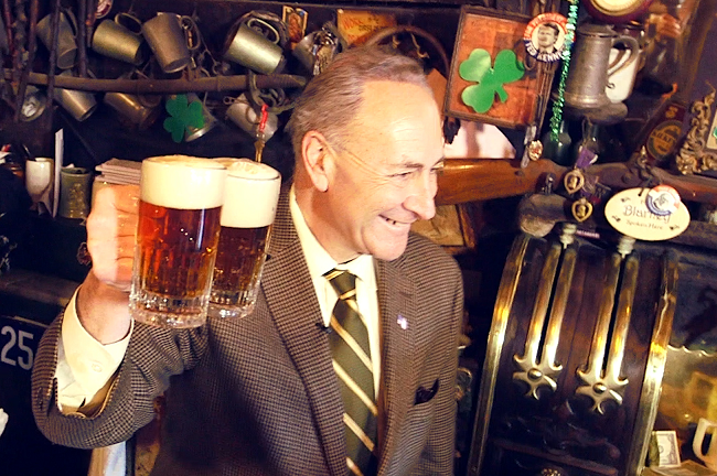 Chuck Schumer with multiple mugs of beer